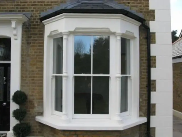 White painted bay window with glazing bars